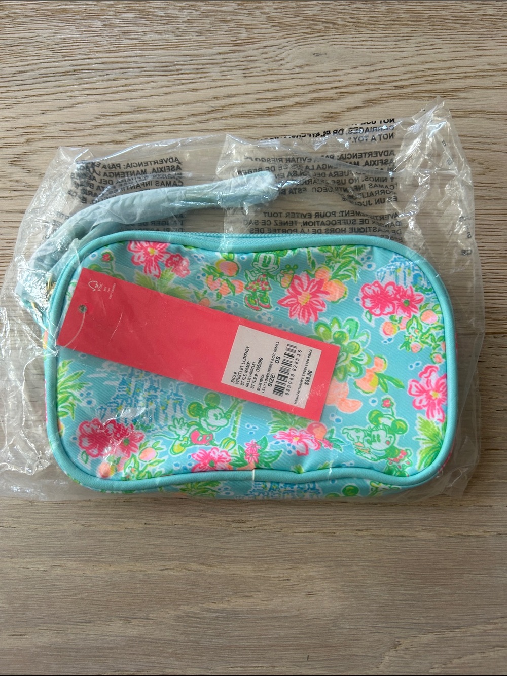 Lilly Pulitzer Disney Aqua Floral Wristlet with Pink Accents